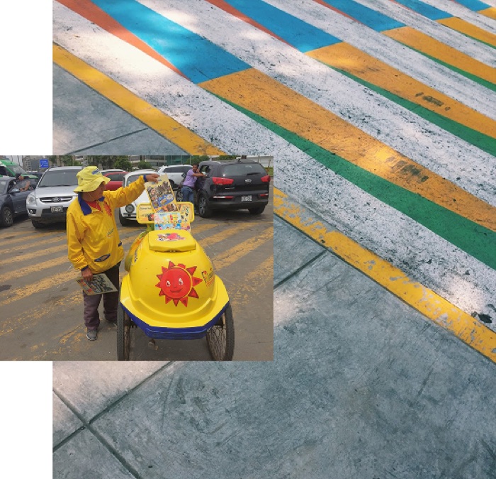 Vendor checking a route printout on the street